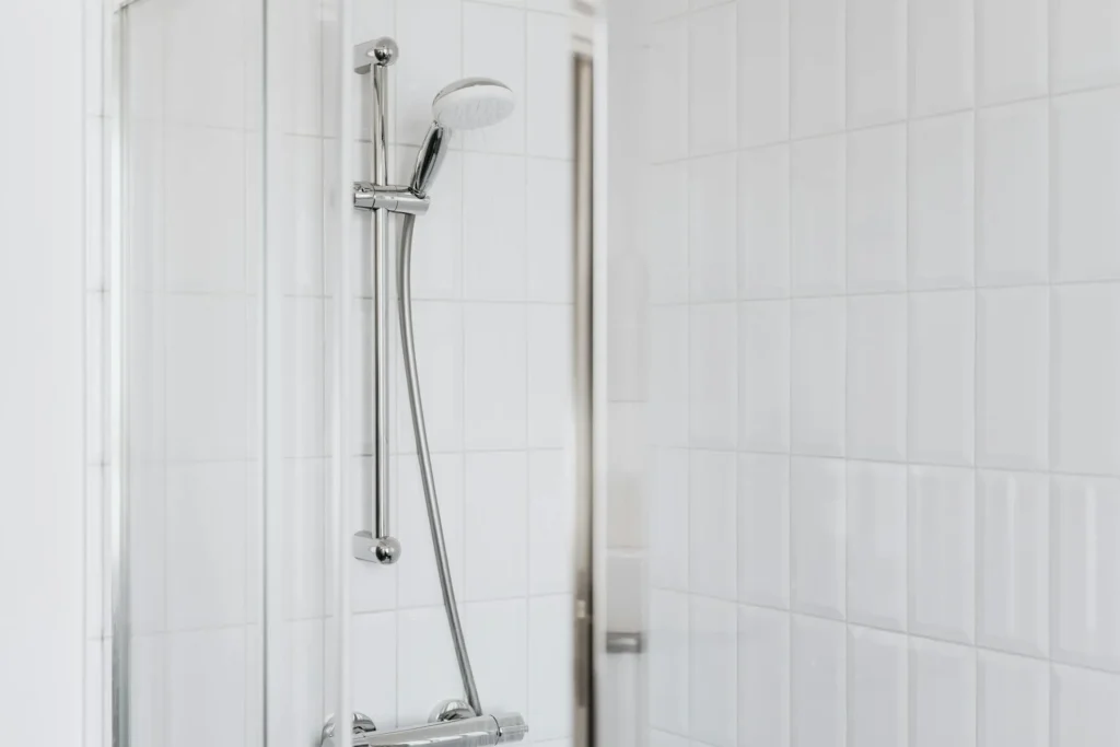 Plumber Repairs Shower Wall Leak In Bay Park With New Pipe & Valve